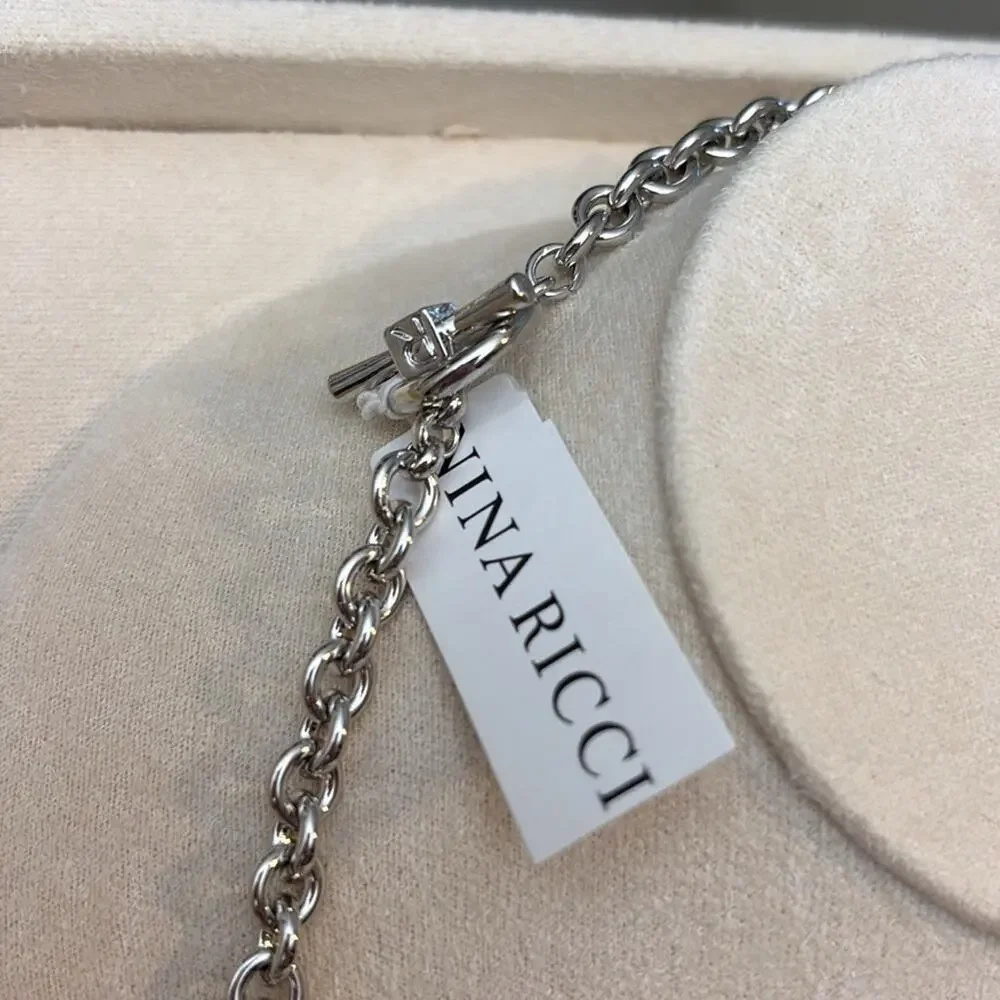 Nina Ricci Rhodium Plated Crystal Charm Necklace Heart Cross Star Horseshoe - Picture 4 of 4